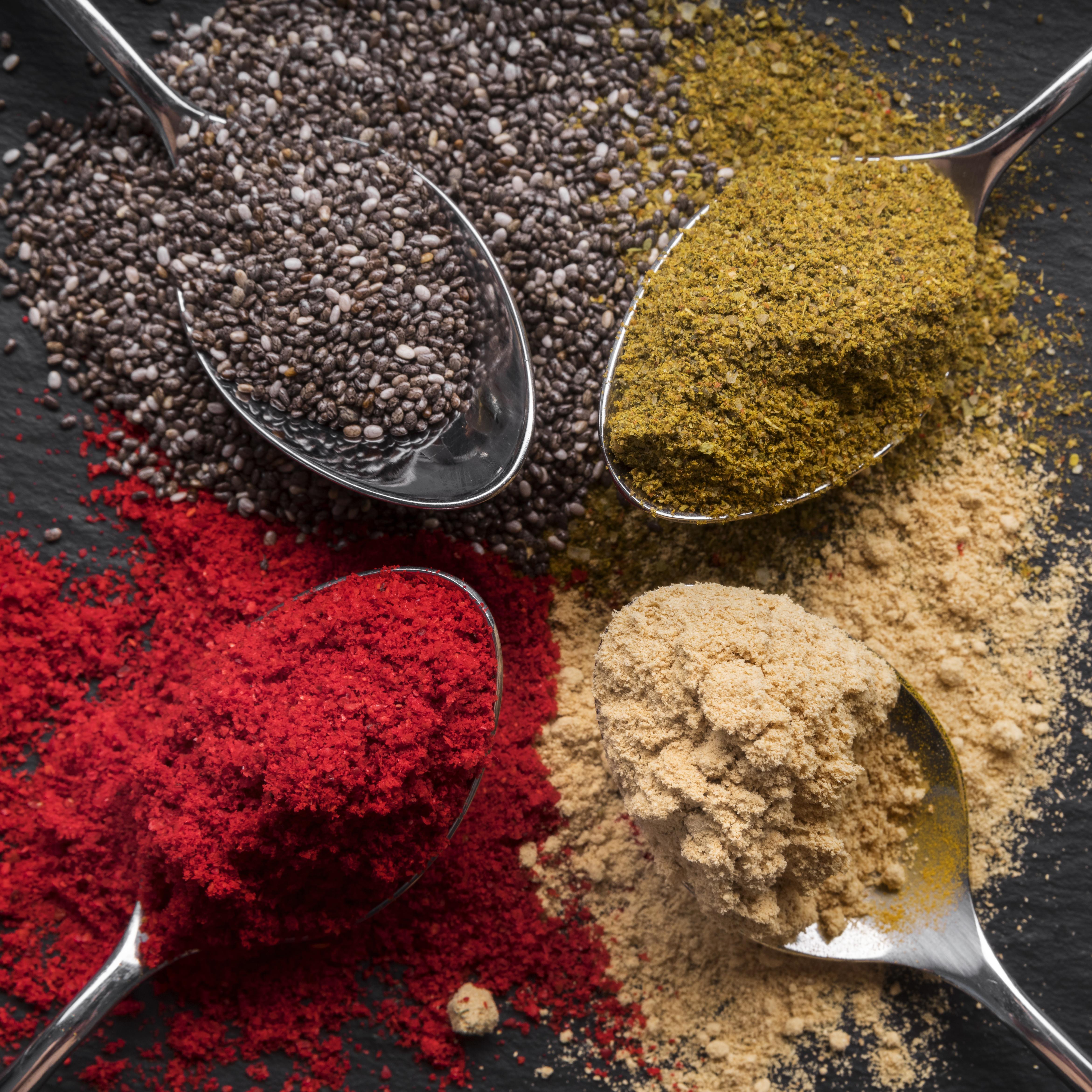 Vibrant array of spices including turmeric, pepper , chili